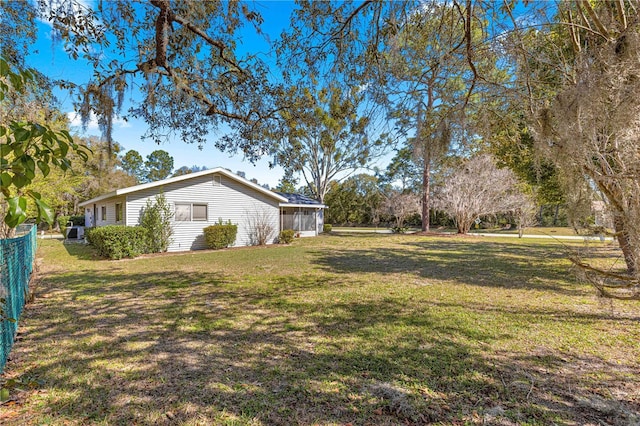 view of yard featuring fence