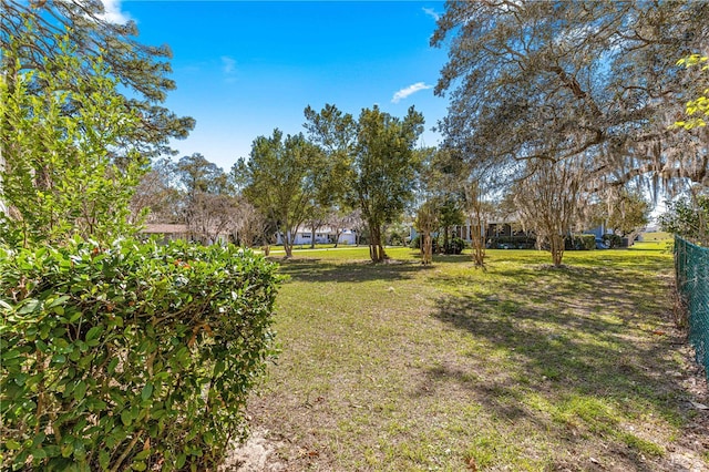 view of yard with fence