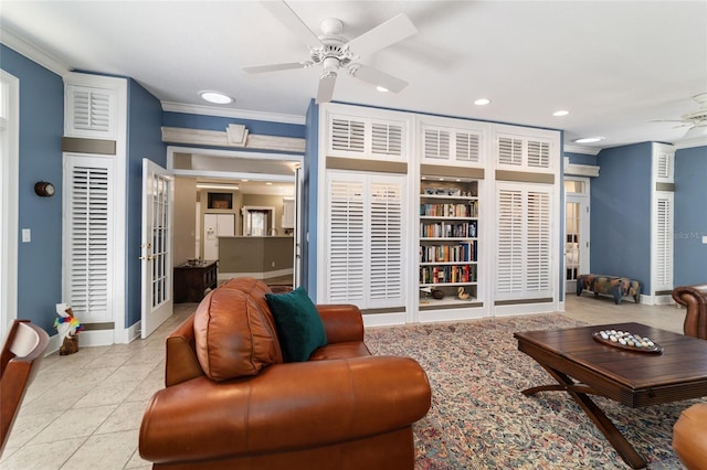 tiled living room featuring ceiling fan, recessed lighting, baseboards, and crown molding