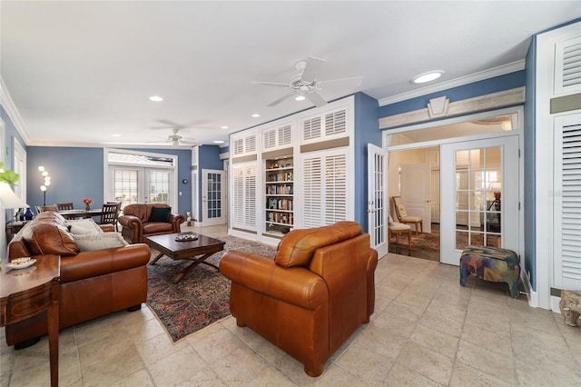 living area featuring built in shelves, recessed lighting, a ceiling fan, ornamental molding, and french doors