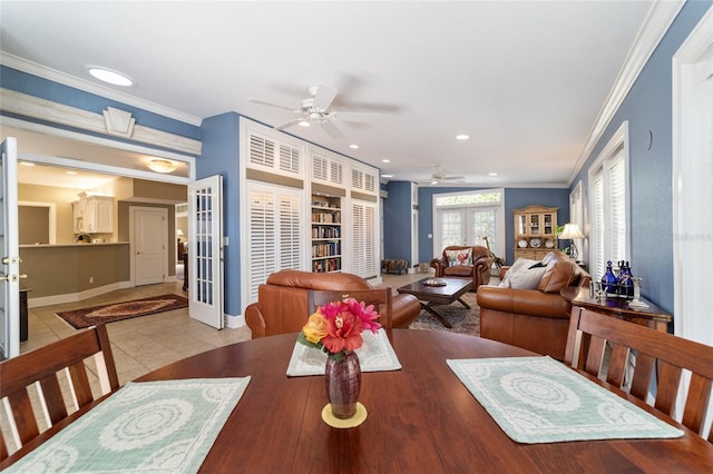 dining area featuring baseboards, light tile patterned flooring, crown molding, french doors, and recessed lighting