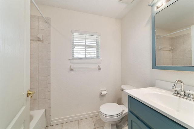 full bath featuring baseboards, toilet, tile patterned floors, bathtub / shower combination, and vanity