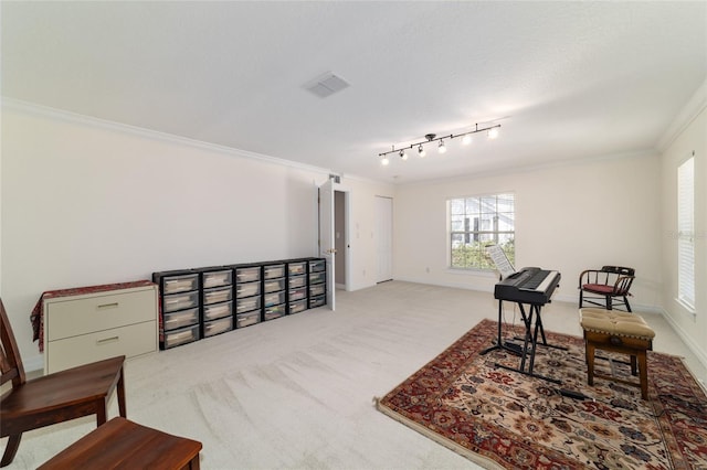 living area featuring baseboards, visible vents, crown molding, and carpet flooring