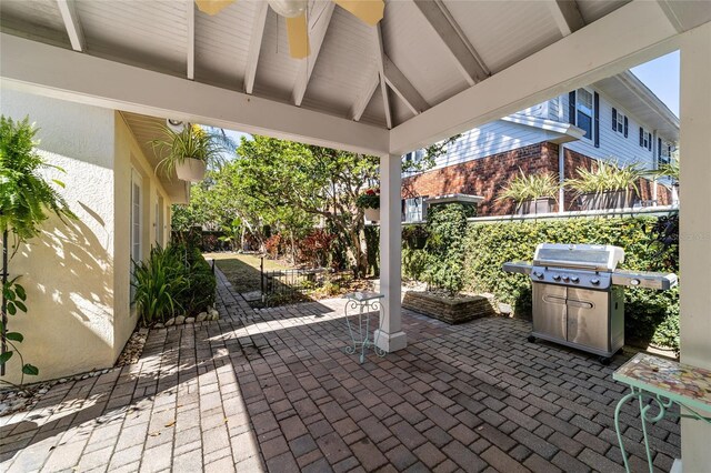 view of patio / terrace featuring a gazebo, fence, and area for grilling