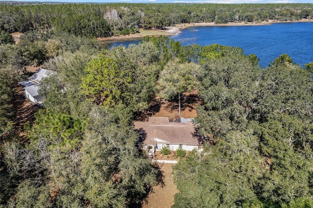 aerial view featuring a water view and a wooded view