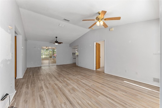 unfurnished living room featuring lofted ceiling, light wood-type flooring, visible vents, and a ceiling fan