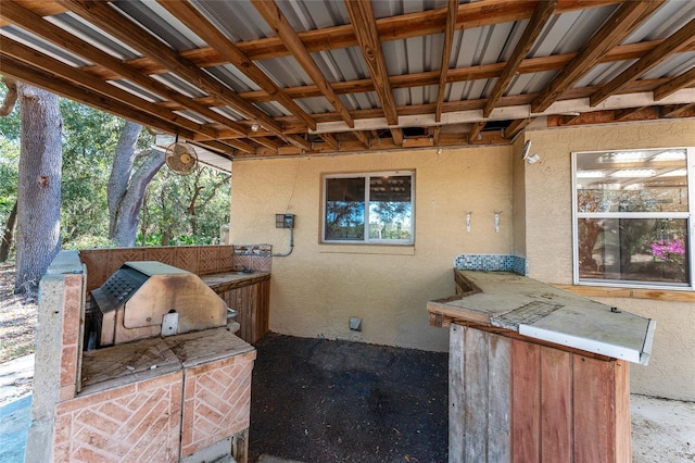 view of patio featuring exterior kitchen and area for grilling