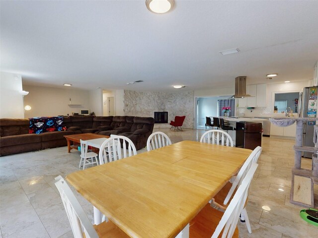 dining room with visible vents