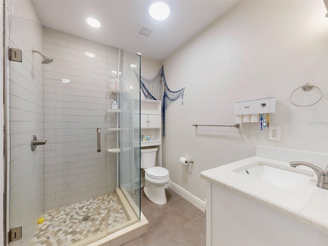 full bathroom featuring toilet, visible vents, vanity, tile patterned floors, and a stall shower