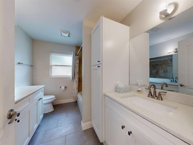 bathroom featuring visible vents, baseboards, toilet, tile patterned flooring, and vanity