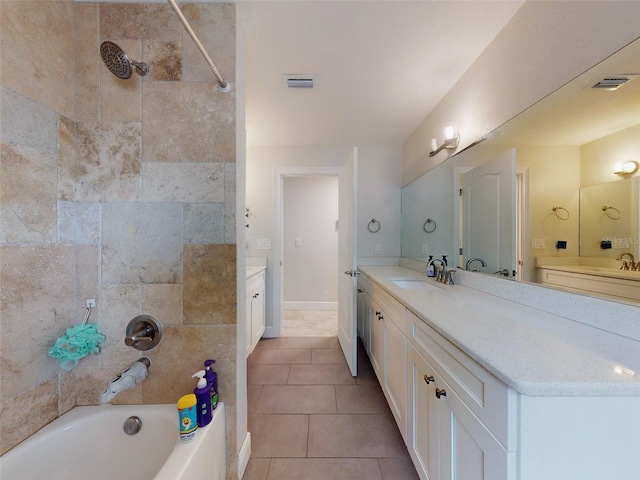 bathroom featuring vanity, shower / bath combination, tile patterned flooring, and visible vents