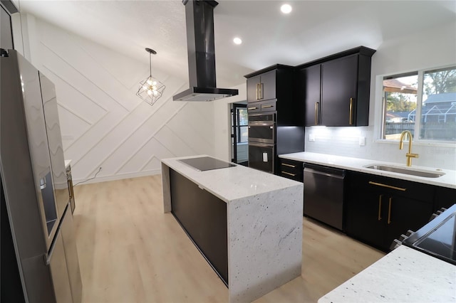 kitchen with pendant lighting, appliances with stainless steel finishes, a sink, a kitchen island, and island range hood