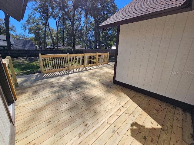 deck featuring a fenced backyard