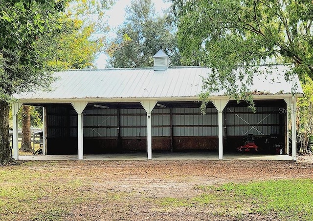 garage with a detached carport