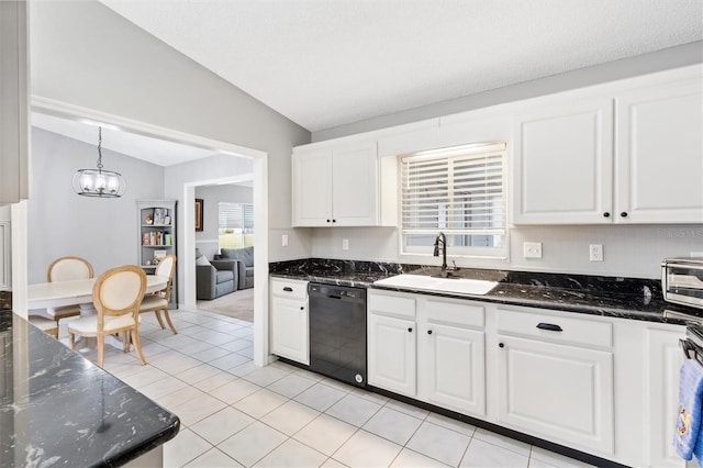 kitchen featuring white cabinets, dishwasher, and a sink