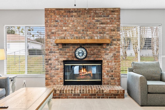 room details featuring carpet floors and a fireplace