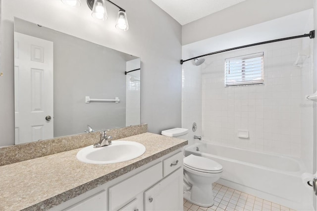 full bathroom featuring shower / bath combination, tile patterned flooring, vanity, and toilet