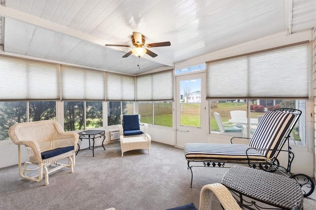 sunroom / solarium featuring ceiling fan