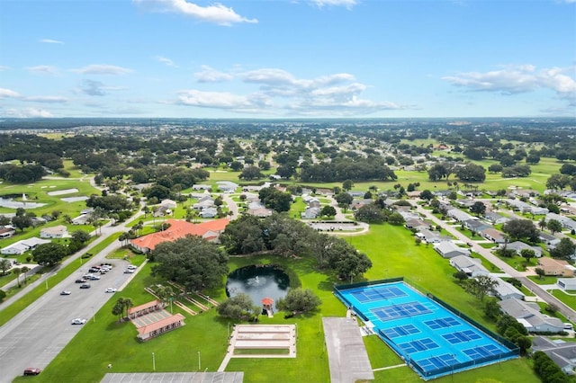 bird's eye view featuring a water view and a residential view