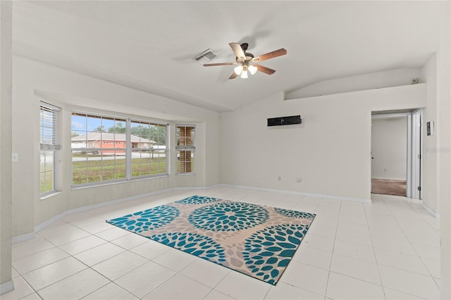 living area with lofted ceiling, visible vents, ceiling fan, and baseboards