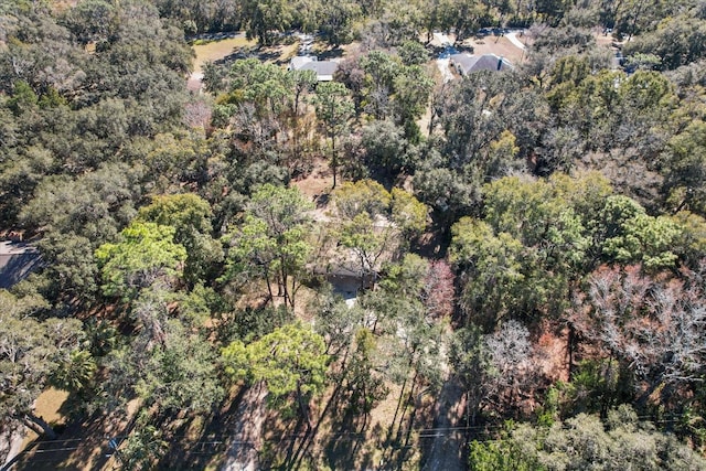 aerial view featuring a view of trees