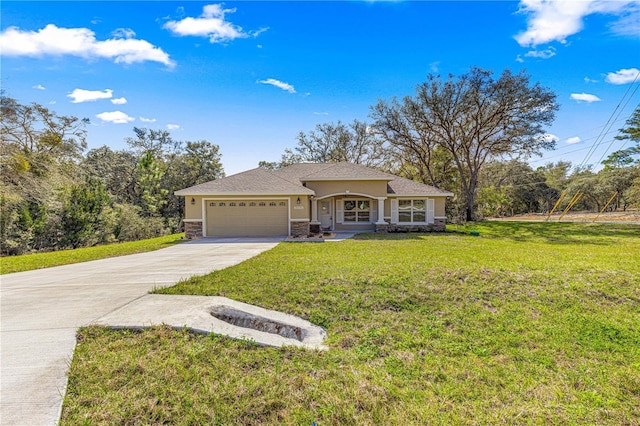 view of front of home featuring a garage, driveway, stone siding, a front yard, and stucco siding