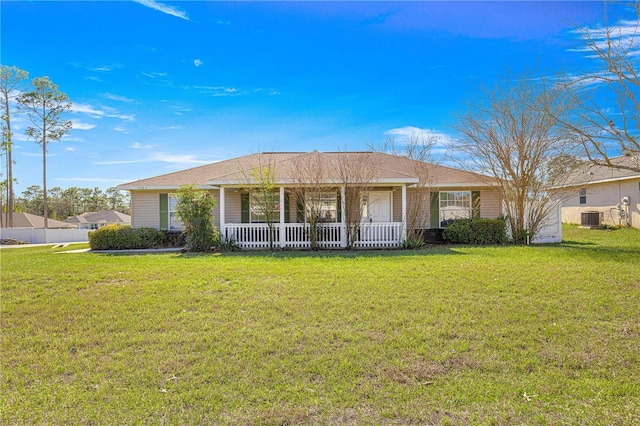 single story home featuring a porch, a front lawn, and central AC unit