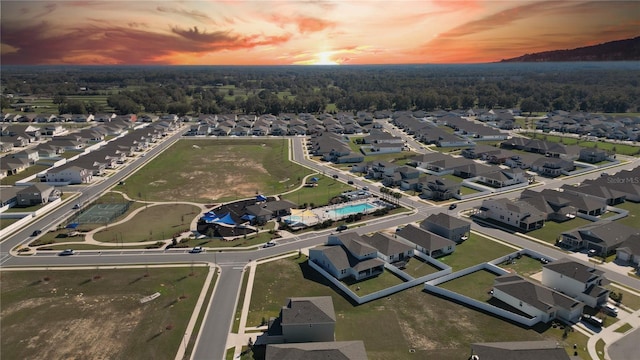 birds eye view of property with a residential view