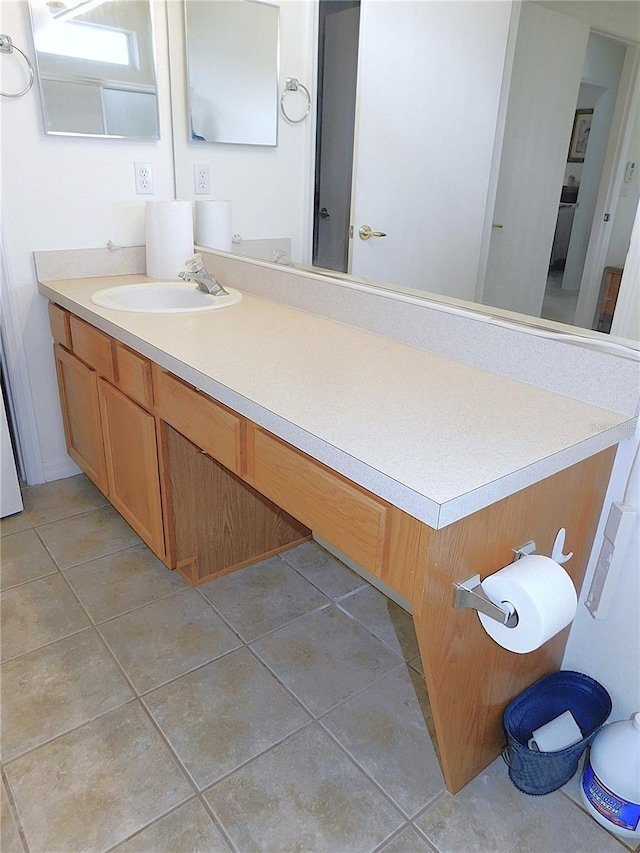 bathroom with vanity and tile patterned floors