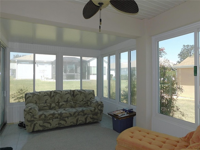 sunroom with a ceiling fan