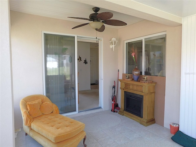 exterior space featuring ceiling fan