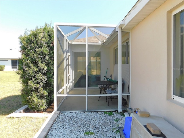 exterior space with a patio and stucco siding