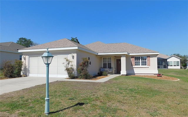 view of front of home featuring driveway, a garage, a front lawn, and stucco siding