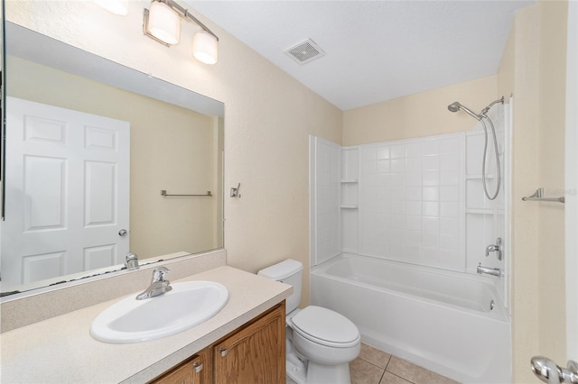 full bathroom with visible vents, shower / bathing tub combination, toilet, vanity, and tile patterned floors