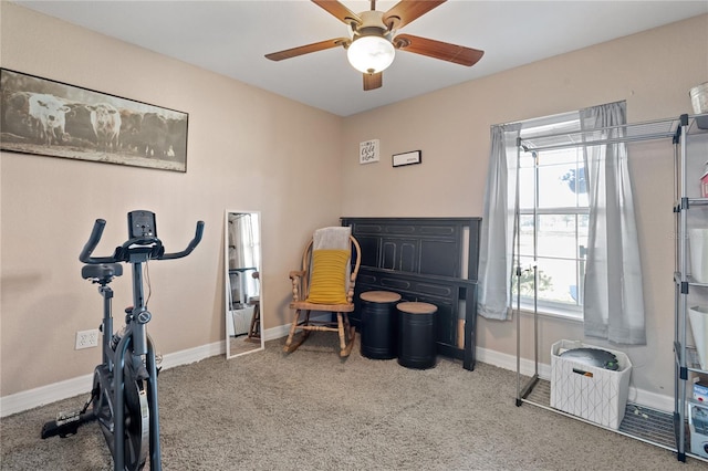 workout area with carpet floors, baseboards, and a ceiling fan