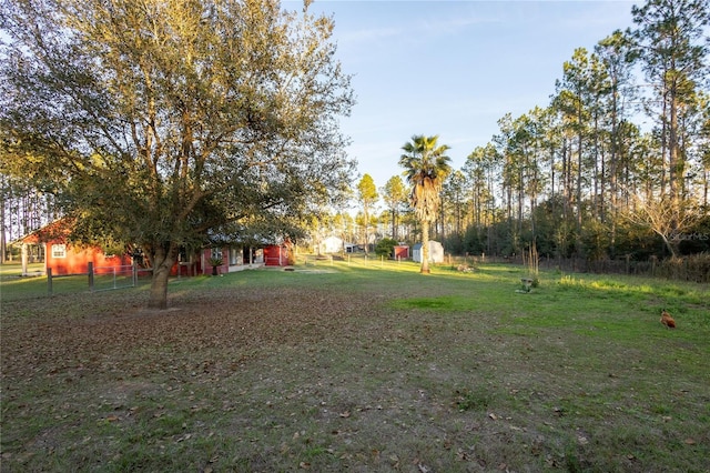 view of yard with fence