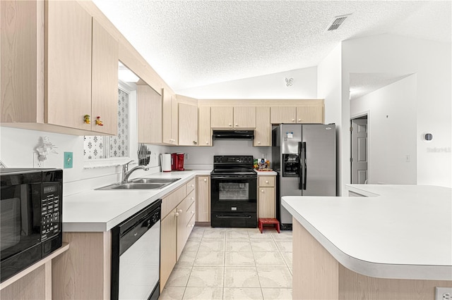 kitchen with vaulted ceiling, light brown cabinets, a sink, and black appliances