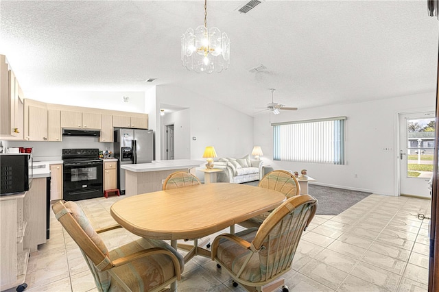 dining room featuring lofted ceiling, visible vents, a textured ceiling, and ceiling fan with notable chandelier