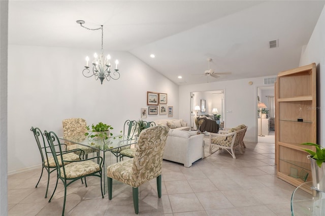 dining room with vaulted ceiling, light tile patterned floors, ceiling fan with notable chandelier, and visible vents