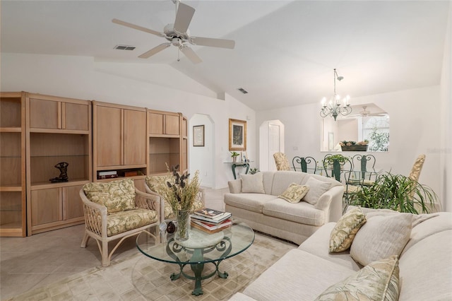 living area featuring ceiling fan with notable chandelier, vaulted ceiling, and visible vents