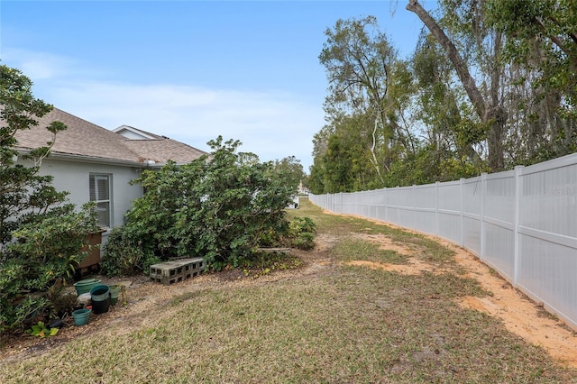 view of yard with fence