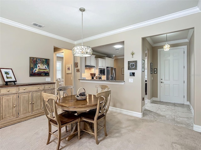 dining area featuring ornamental molding, visible vents, light carpet, and baseboards