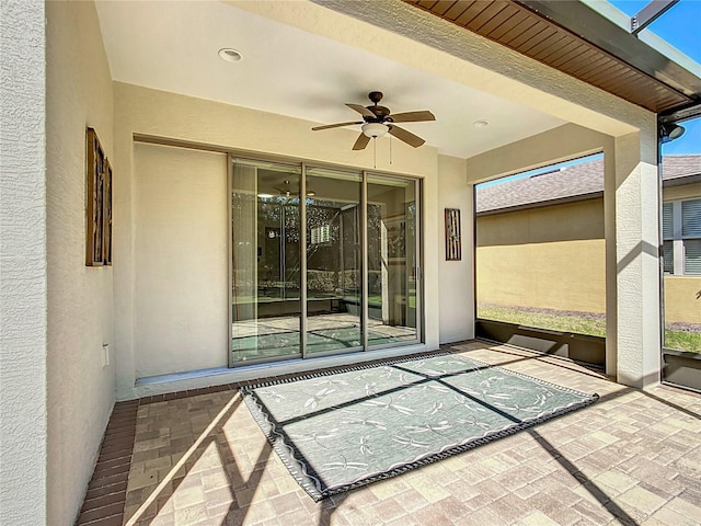 view of patio / terrace with ceiling fan