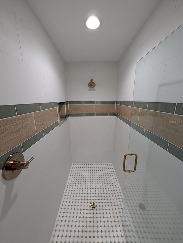 full bathroom with a stall shower
