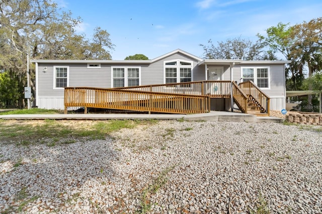 view of front of home with a wooden deck