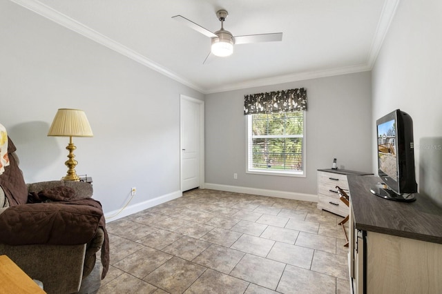 sitting room with ornamental molding, light tile patterned floors, baseboards, and a ceiling fan