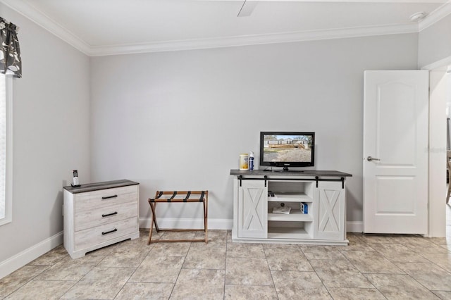 interior space featuring crown molding, light tile patterned floors, and baseboards