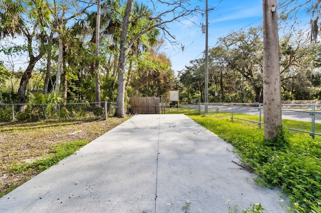 exterior space featuring a patio area and fence