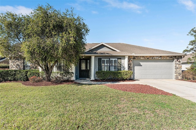 ranch-style house featuring driveway, stone siding, an attached garage, and a front yard