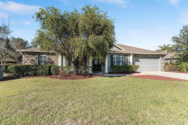 view of front of house featuring driveway, stone siding, a garage, and a front lawn